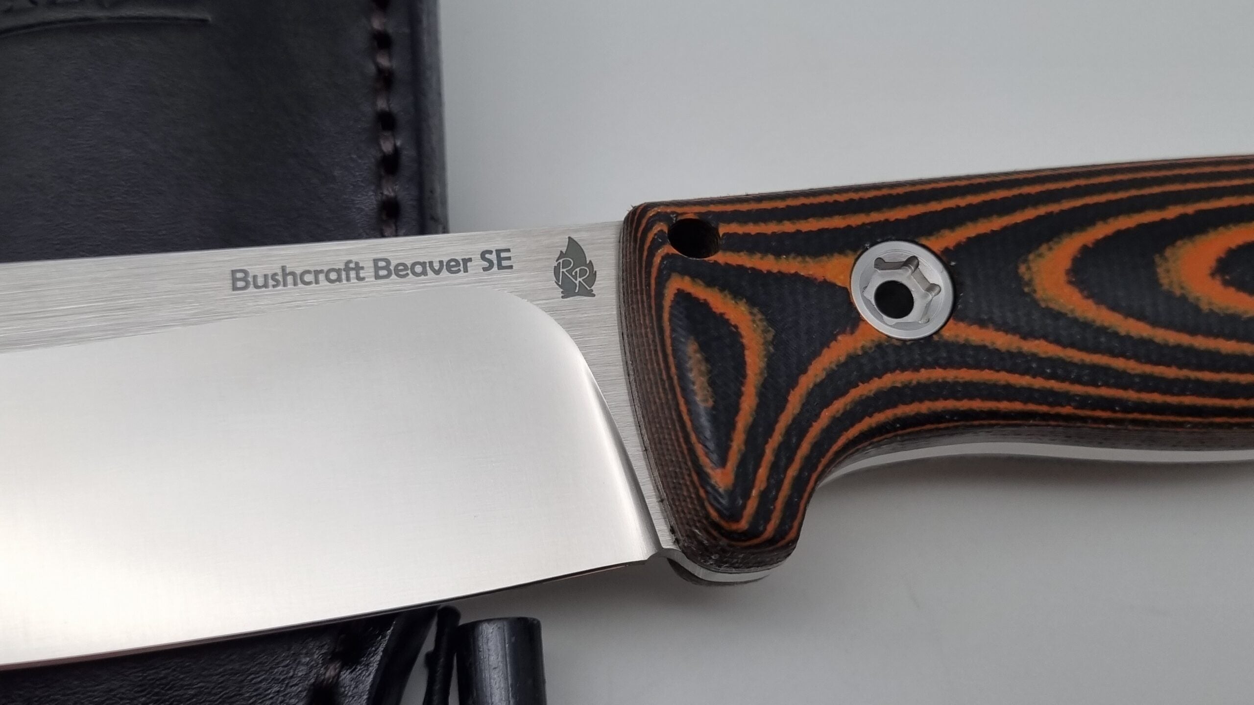 Bushcraft Beaver SE Reini Rossmann Micarta Outdoor Jagd Bushcraft Messer Orange/Black  Leather